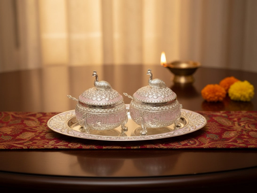Art N Soul German silver serving bowl set with two peacock-crested lids and a matching tray for festive gifting.